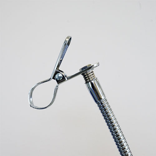 FLEXIBLE HOLDER CLAMP FOR DRYER