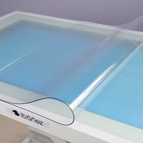 TRANSPARENT COVER FOR ELECTRIC TABLES